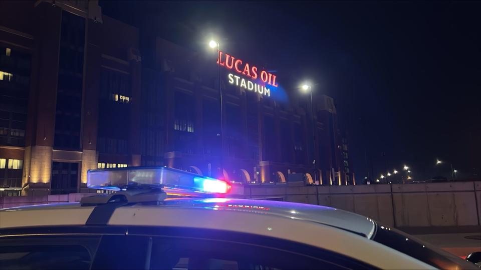 Indianapolis police remain on scene outside Lucas Oil Stadium on Friday, Sept. 22, 2023, after reporting an officer-involved shooting.