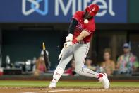 Philadelphia Phillies' Bryce Harper breaks his bat on a pitch thrown by Texas Rangers' Dennis Santana in the eighth inning of a baseball game, Wednesday, June 22, 2022, in Arlington, Texas. Harper struck out in the ab-bat. (AP Photo/Tony Gutierrez)