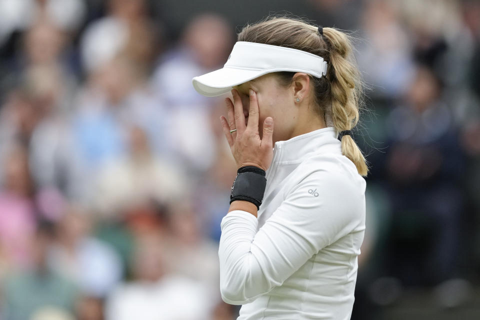 Anna Kalinskaya of Russia reacts during her fourth round match against Elena Rybakina of Kazakhstan at the Wimbledon tennis championships in London, Monday, July 8, 2024. (AP Photo/Kirsty Wigglesworth)