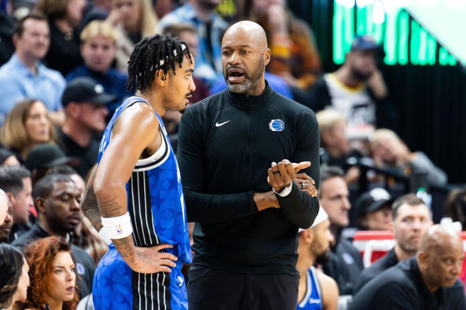 Orlando Magic head coach Jamahl Mosley talks to Orlando Magic guard <a class="link " href="https://sports.yahoo.com/nba/players/5330" data-i13n="sec:content-canvas;subsec:anchor_text;elm:context_link" data-ylk="slk:Gary Harris;sec:content-canvas;subsec:anchor_text;elm:context_link;itc:0">Gary Harris</a> (14) during an NBA basketball game between the Utah Jazz and Orlando Magic at the Delta Center in Salt Lake City on Thursday, Nov. 2, 2023. | Megan Nielsen, Deseret News