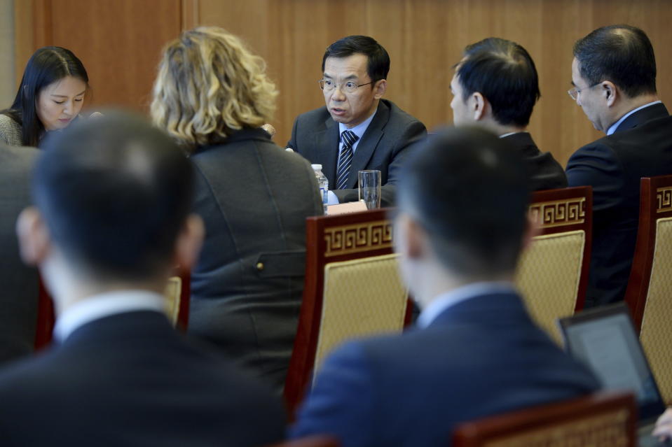 Chinese Ambassador to Canada Lu Shaye, center, meets with media at the Chinese Embassy in Ottawa, Ontario, Thursday, Jan. 17, 2019. (Sean Kilpatrick/The Canadian Press via AP)