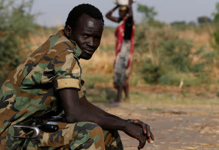 A soldier looks on near the town of Bentiu in Rubkona county, northern South Sudan, February 11, 2017. Picture taken February 11, 2017. REUTERS/Siegfried Modola