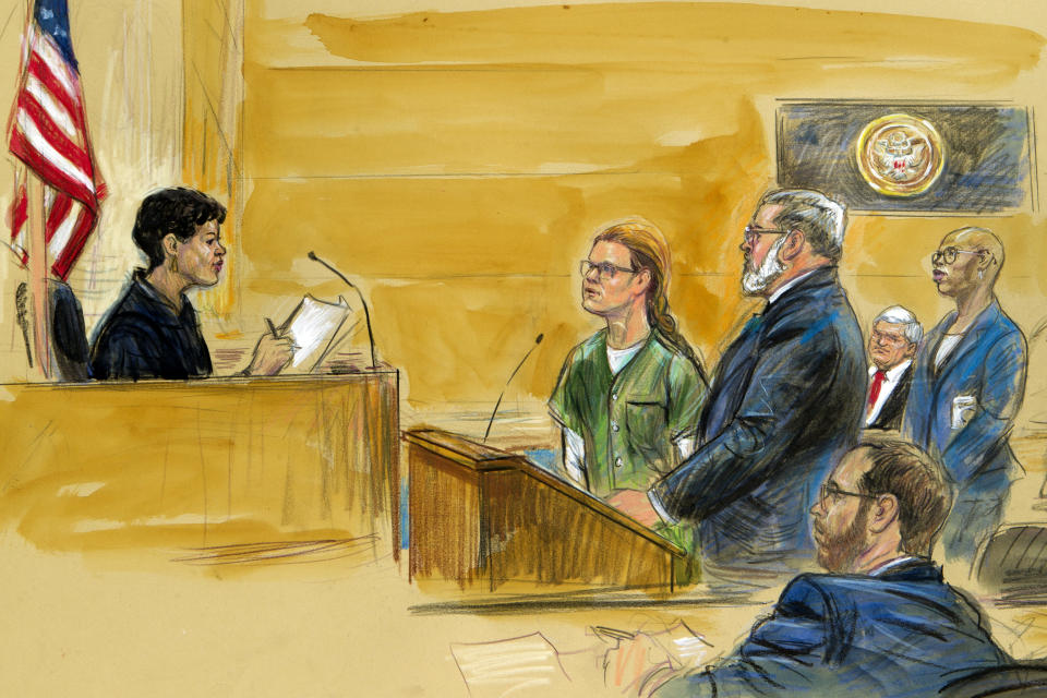 In this courtroom sketch, Maria Butina, left, is shown next to her attorney Robert Driscoll, before U.S. District Judge Tanya Chutkan, during a court hearing at the U.S. District Court in Washington, Thursday, Dec. 13, 2018. Maria Butina, a Russian accused of being a secret agent for the Russian government, has pleaded guilty to a conspiracy charge in federal court in Washington. (Dana Verkouteren via AP)