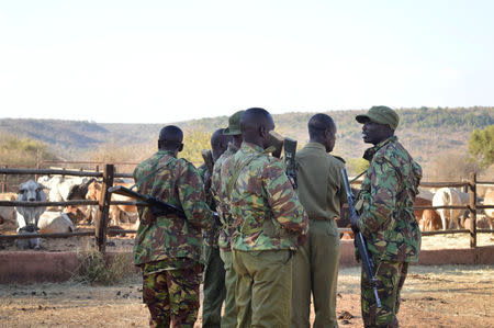 Kenya police officers gather as they are deployed to guard Sosian ranch following the killing of Tristan Voorspuy a British co–owner of the Sosian ranch in the drought-stricken Laikipia region, Kenya, March 6, 2017. REUTERS/Stringer