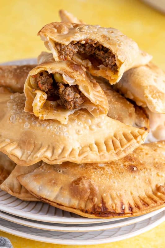 <p>Salima's Kitchen</p><p> These Puerto Rican Empanadillas are made with fried buttery pie dough stuffed with seasoned ground beef, peppers and olives.</p><p><strong>Get the recipe:</strong> <a href="https://salimaskitchen.com/empanadillas-fried-puerto-rican-turnovers/" rel="nofollow noopener" target="_blank" data-ylk="slk:Puerto Rican Empanadillas;elm:context_link;itc:0;sec:content-canvas" class="link ">Puerto Rican Empanadillas</a></p><p> <strong>Related:</strong> <a href="https://parade.com/169996/ericadinho/10-scrumptious-dulce-de-leche-recipes/" rel="nofollow noopener" target="_blank" data-ylk="slk:10 Scrumptious Dulce de Leche Recipes;elm:context_link;itc:0;sec:content-canvas" class="link "><strong>10 Scrumptious Dulce de Leche Recipes</strong></a></p>