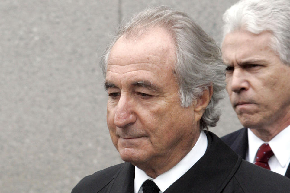 FILE - In this March 10, 2009, file photo, former financier Bernie Madoff leaves federal court in Manhattan, in New York. Madoff, the financier who pleaded guilty to orchestrating the largest Ponzi scheme in history, has died in prison, a person familiar with the matter tells The Associated Press. (AP Photo/David Karp, File)