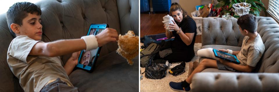 LEFT: Saleh Humaid, 8, of Gaza, talks with his father, Ahmed Humaid, on an iPad as he prepares to leave his host family's home in Dearborn Heights on Wednesday, Aug. 9, 2023, to return to his country after getting a prosthetic leg and rehabilitation in the United States. RIGHT: Saleh Humaid, 8, of Gaza, sits on a couch with an iPad as Palestine Children's Relief Fund Detroit chapter president Yasmeen Hamed finishes packing suitcases with items for Saleh and his family.