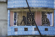 <p>Bangladeshi police inspect a two-story house after a raid in Narayanganj, outskirts of Dhaka, Saturday, Aug. 27, 2016. Police in Bangladesh say they have killed three suspected militants, including Tamim Chowdhury, a Bangladeshi-born Canadian, who police believe was one of two masterminds of the attack on a popular restaurant in Dhaka. (AP Photo) </p>