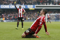 Marc McNulty celebrates after scoring the opening goal in Sheffield United's 3-0 FA Cup victory over Queens Park Rangers at Loftus Road on January 4, 2015 (AFP Photo/Justin Tallis)
