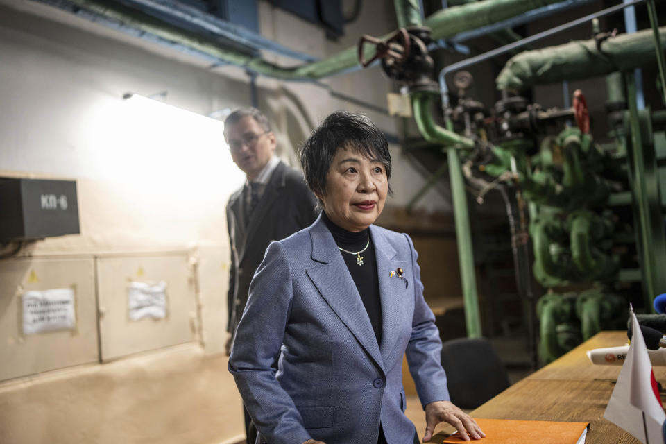 Japan's Foreign Minister Yoko Kamikawa leaves after speaking to the media during a press conference with Ukraine's Foreign Minister Dmytro Kuleba at the bomb shelter in Kyiv, Ukraine, on Sunday, Jan. 7, 2024. (AP Photo/Evgeniy Maloletka)