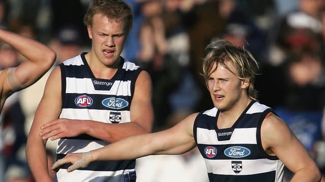 Nathan and Gary Ablett playing for Geelong together. Image: Getty