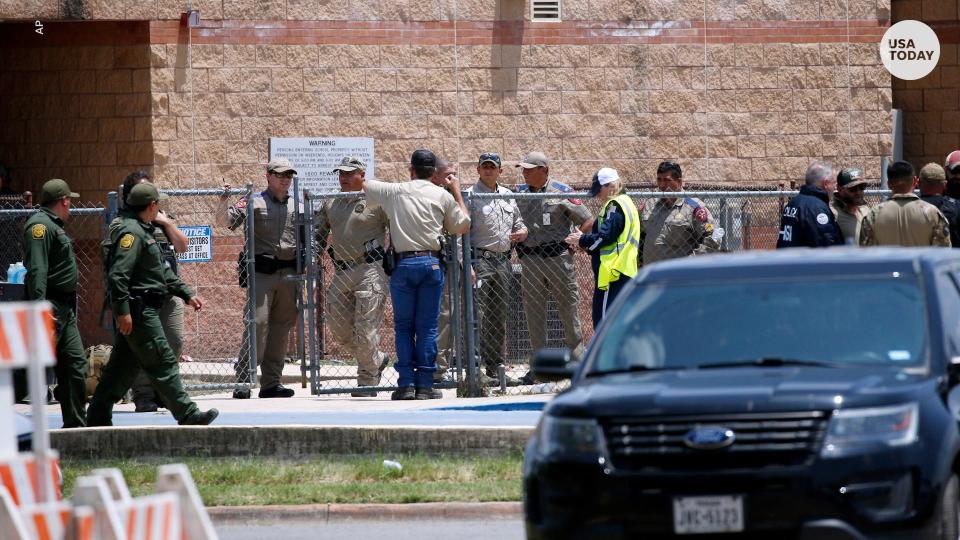 Law enforcement, and other first responders, gather outside Robb Elementary School following a shooting, Tuesday, May 24, 2022, in Uvalde, Texas. (AP Photo/Dario Lopez-Mills)