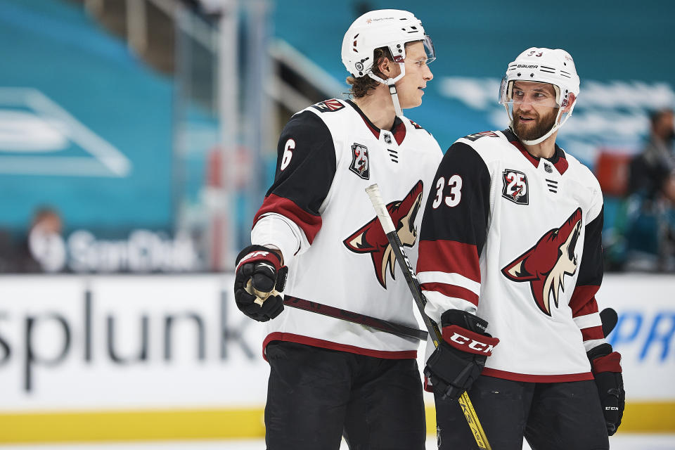 SAN JOSE, CA - May 8: Arizona Coyotes defenseman Jakob Chychrun (6) and Arizona Coyotes defenseman Alex Goligoski (33) talk during the San Jose Sharks game versus the Arizona Coyotes on May 8, 2021, at SAP Center at San Jose in San Jose, CA. (Photo by Matt Cohen/Icon Sportswire via Getty Images)