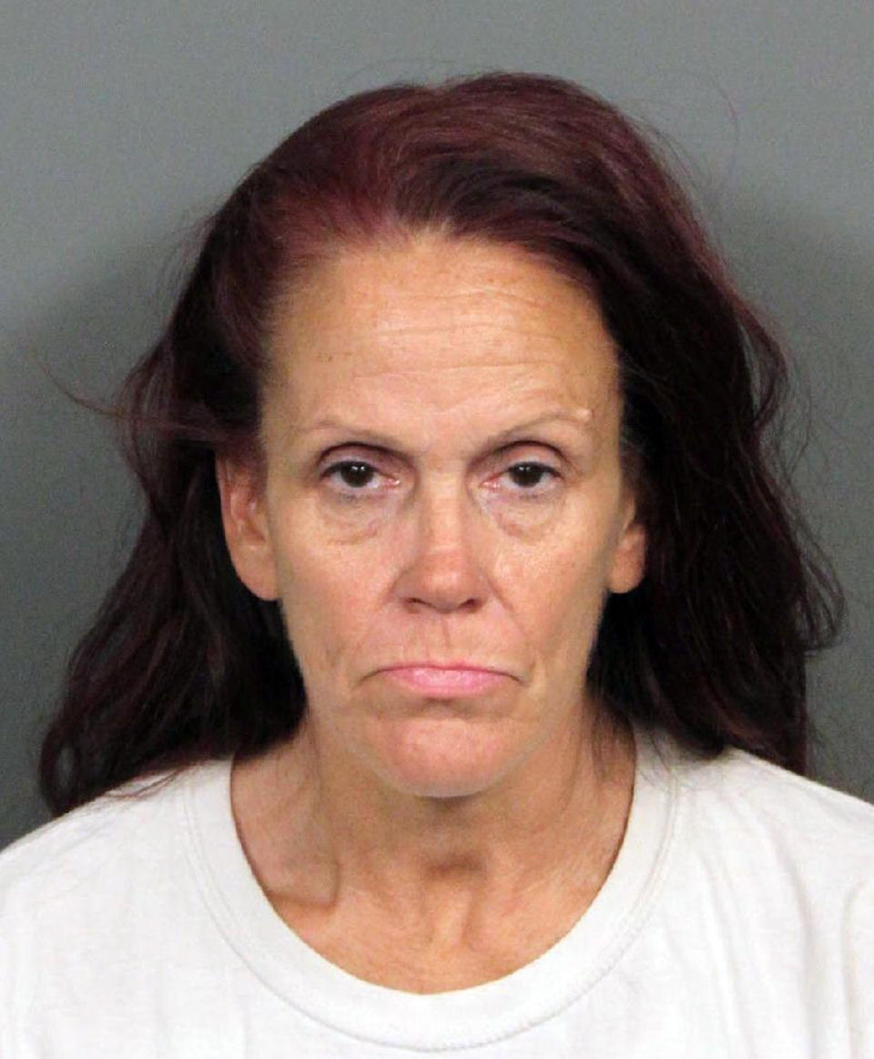 This booking photo released by Riverside County Animal Services on Tuesday, April 23, 2019, shows Deborah Sue Culwell. The California woman could face up to seven years behind bars on a slew of charges filed Tuesday after authorities say surveillance video showed her casually tossing a bag of 3-day-old, palm-sized puppies into a trash can on a sweltering day. (Riverside County Animal Services via AP)