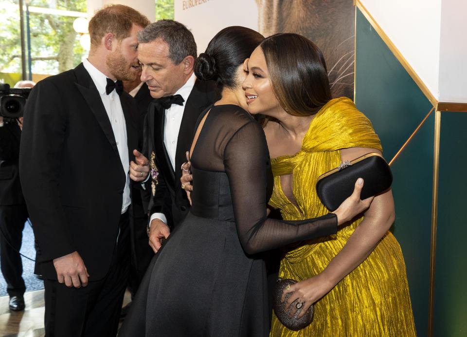 LONDON, ENGLAND - JULY 14: Prince Harry, Duke of Sussex and Meghan, Duchess of Sussex greet Disney CEO Robert Iger US singer-songwriter Beyoncé at the European Premiere of Disney's "The Lion King" at Odeon Luxe Leicester Square on July 14, 2019 in London, England.  (Photo by Niklas Halle'n-WPA Pool/Getty Images)