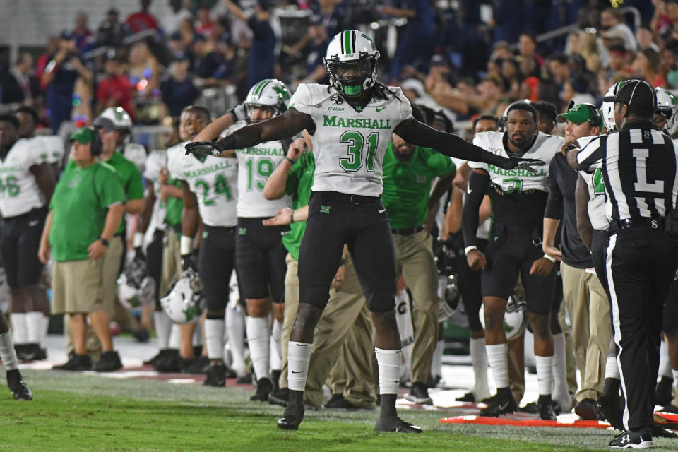 BOCA RATON, FL - OCTOBER 18: Omari Cobb #31 of the Marshall Thundering Herd celebrates after breaking up a pass in the first half of the game against the Florida Atlantic Owls at FAU Stadium on October 18, 2019 in Boca Raton, Florida. (Photo by Eric Espada/Getty Images)