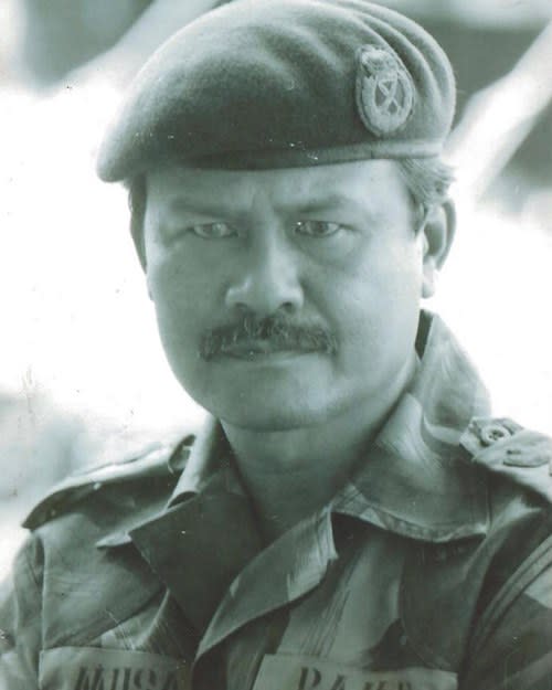 Harith shared a photo of his late father, Colonel Musa bin Mohamed