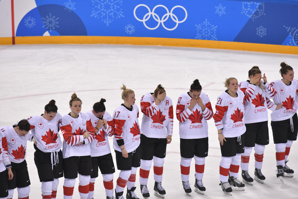 <p>Team Canada looks on during the medal ceremony after they took the silver medal in the women’s ice hockey event during the Pyeongchang 2018 Winter Olympic Games at the Gangneung Hockey Centre in Gangneung on February 22, 2018. / AFP PHOTO / Ed JONES </p>