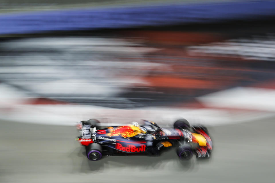 Red Bull Racing driver Max Verstappen of Netherlands steers his car during second practice at the Marina Bay City Circuit ahead of the Singapore Formula One Grand Prix in Singapore, Friday, Sept. 14, 2018. (AP Photo/Yong Teck Lim)