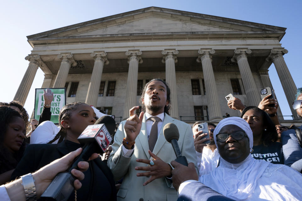 FILE - State Rep. Justin Jones, D-Nashville, delivers remarks outside the state Capitol, April 10, 2023, in Nashville, Tenn. Extreme views adopted by some local, state and federal political leaders who try to limit what history can be taught and undermine how Black leaders perform their jobs are among the leading threats to democracy for Black Americans, according to a National Urban League report to be released Saturday. Urban League President Marc Morial cited the most recent example, the vote earlier this month by the Republican-controlled Tennessee House ousting two Black representatives, Justin J. Pearson and Jones, for violating a parliamentary decorum rule. (AP Photo/George Walker IV, File)