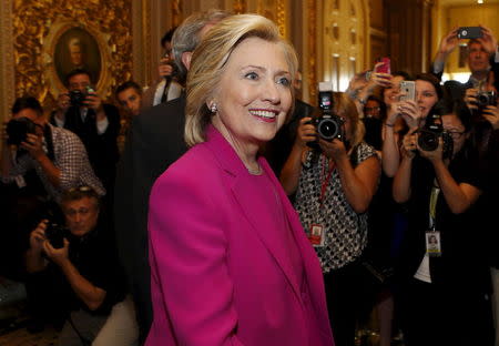 U.S. Democratic Presidential candidate Hillary Clinton arrives at the Senate Democratic weekly policy luncheon on Capitol Hill in Washington July 14, 2015. REUTERS/Yuri Gripas