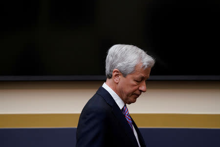 FILE PHOTO: Jamie Dimon, chairman & CEO of JP Morgan Chase & Co., arrives to testify before a House Financial Services Committee hearing on "Holding Megabanks Accountable: A Review of Global Systemically Important Banks 10 Years After the Financial Crisis" on Capitol Hill in Washington, U.S., April 10, 2019. REUTERS/Aaron P. Bernstein/File Photo