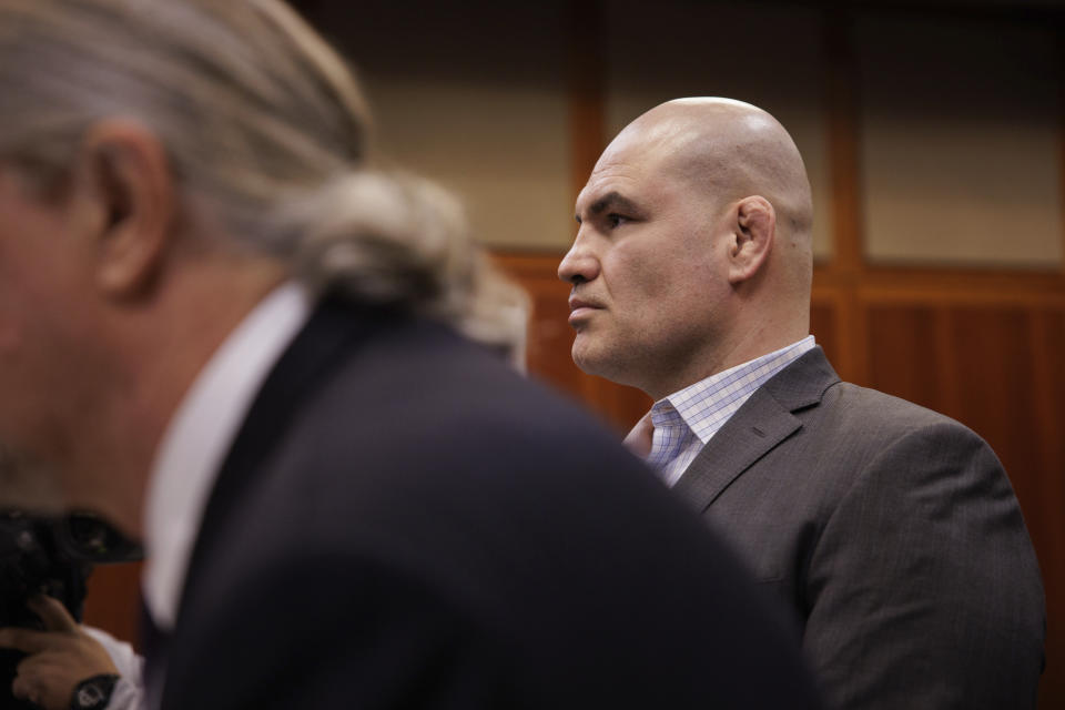 Cain Velasquez, right, appears for his arraignment with attorney Edward Sousa, who appeared with him, at the Santa Clara County Hall of Justice on Monday, Nov. 21, 2022, in San Jose, Calif. Velasquez, the former UFC champion based out of San Jose, was charged with shooting at a man accused of molesting his child. (Dai Sugano/Bay Area News Group via AP, Pool)