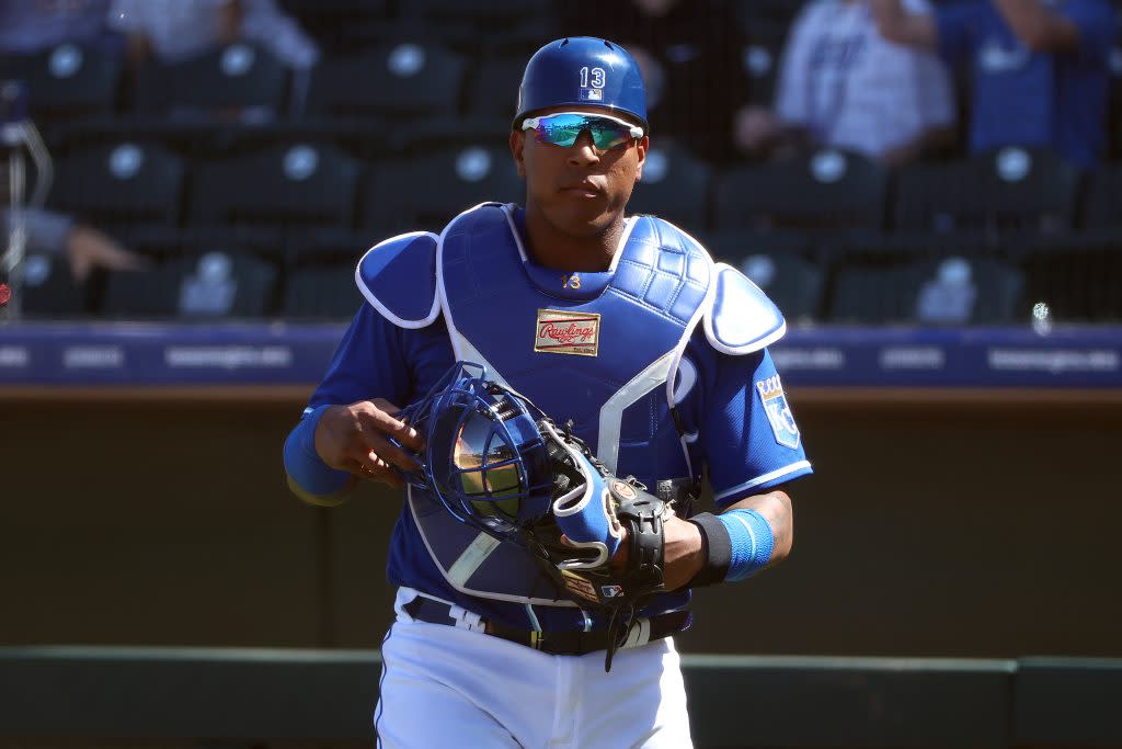 Salvador Perez #13 of the Kansas City Royals looks on in the fourth inning against the Los Angeles Angels during the MLB spring training game at Surprise Stadium on March 19, 2021 in Surprise, Arizona. (Photo by Abbie Parr/Getty Images)