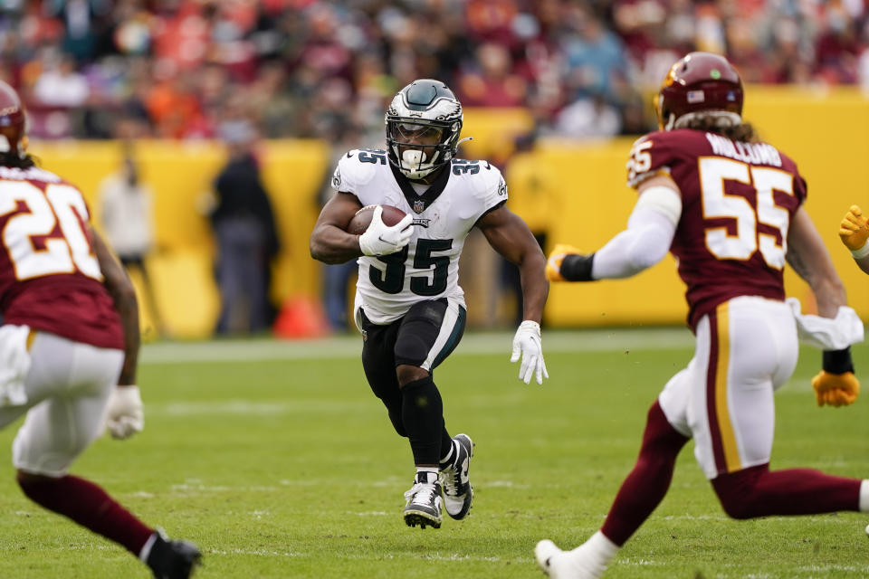 Philadelphia Eagles running back Boston Scott (35) running with the ball against the Washington Football Team during the first half of an NFL football game, Sunday, Jan. 2, 2022, in Landover, Md. (AP Photo/Alex Brandon)