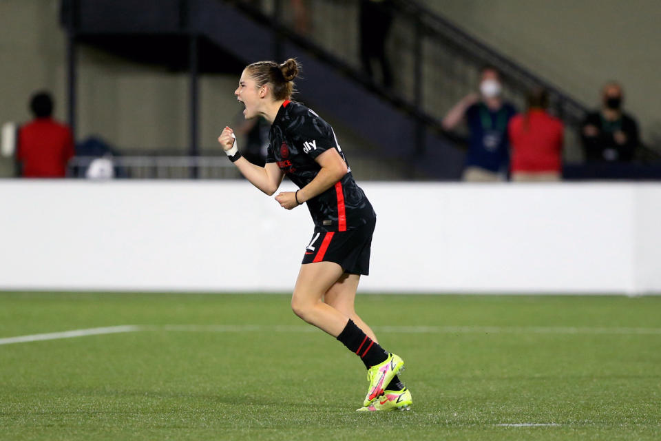 Portland Thorns midfielder Olivia Moultrie celebrates after scoring a penalty kick against the Houston Dash in a semifinals matchup of the Women's International Champions Cup at Providence Park in Portland, Ore., Wednesday, Aug. 18, 2021. It's been a little more than a year since Olivia Moultrie signed with the Portland Thorns after suing to join the National Women's Soccer League at just 15 years old. For Moultrie, the lasting lesson of her legal odyssey is that women should have the same opportunities to reach the top tier of U.S. pro soccer as men. Even if they're still teenagers. (Sean Meagher/The Oregonian via AP)