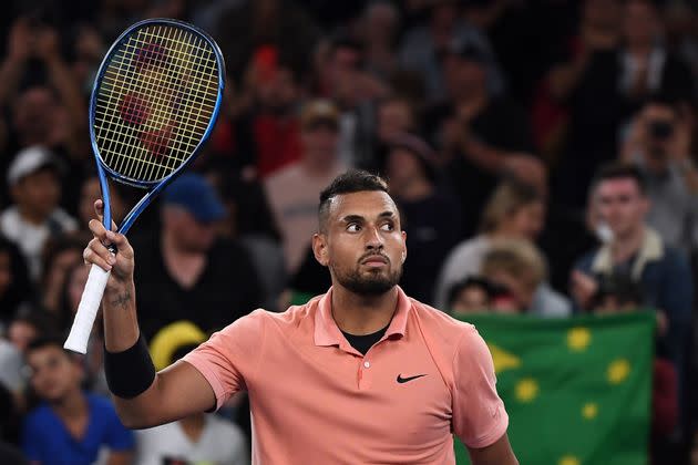 Australia's Nick Kyrgios celebrates victory against Italy's Lorenzo Sonego during their men's singles match on day two of the Australian Open tennis tournament in Melbourne on January 21, 2020. 