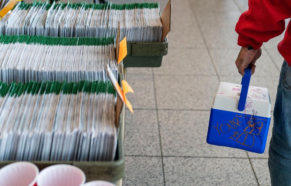 The message "You're the Best," written by the daughters of an election inspector, decorates his lunch cooler as he arrives to count ballots at City Hall in Warren, Michigan, on Nov. 3, 2020.