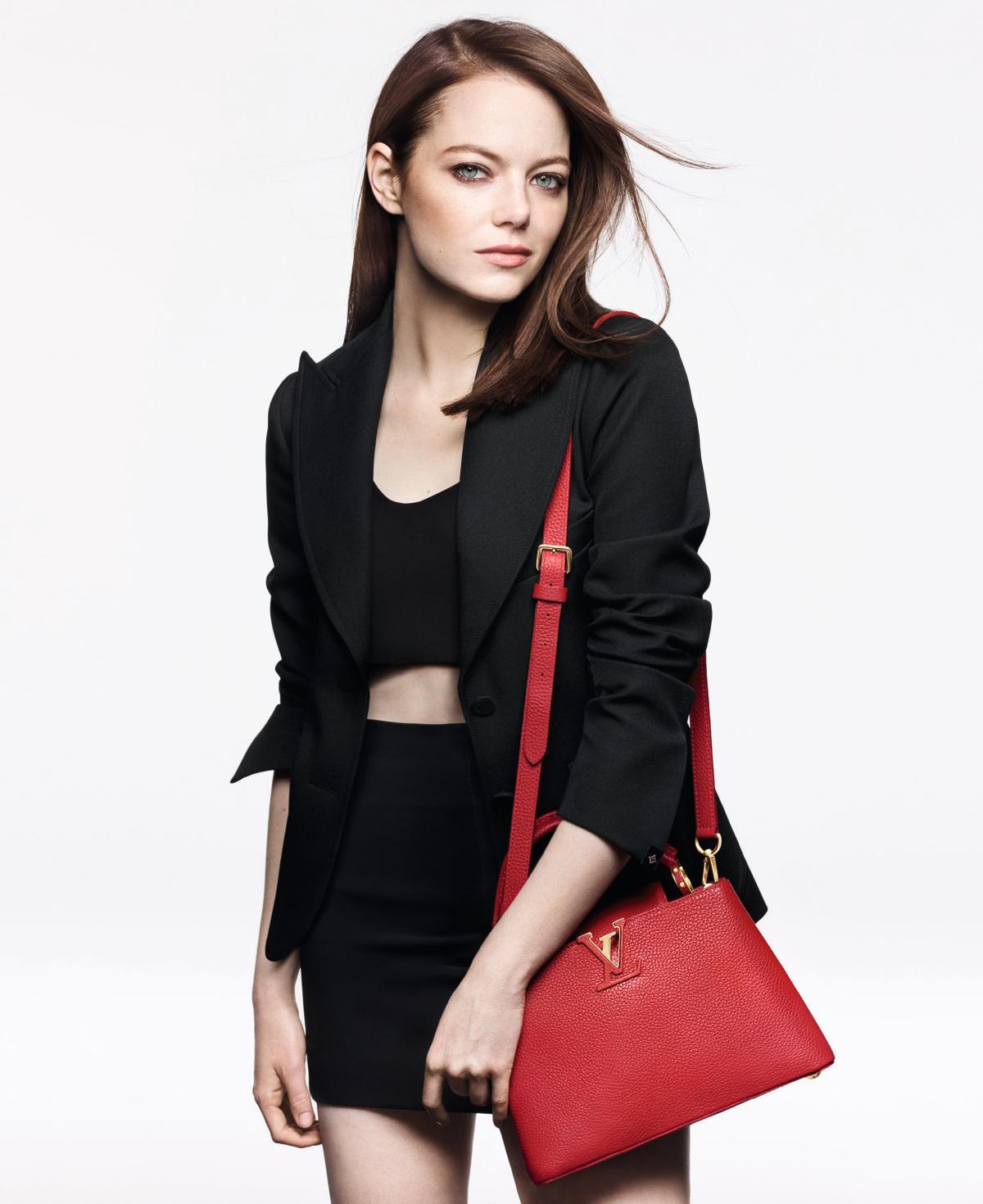 Emma Stone Is Cradling Her Bag Like a Baby in This Louis Vuitton