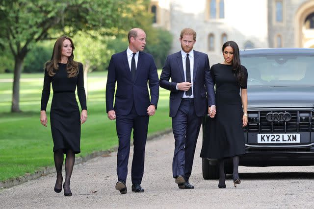 <p>Chris Jackson - WPA Pool/Getty</p> Kate Middleton, Prince William, Prince Harry and Meghan Markle on the Long Walk at Windsor Castle on Sept. 10, 2022.