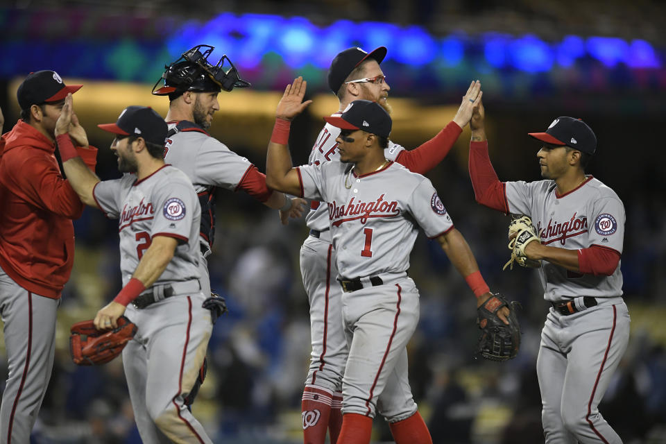 LOS ANGELES, CA - MAY 09: The Washington Nationals celebrate after defeating the Los Angeles Dodgers at Dodger Stadium on May 9, 2019 in Los Angeles, California. The Nationals won 6-0. (Photo by John McCoy/Getty Images)