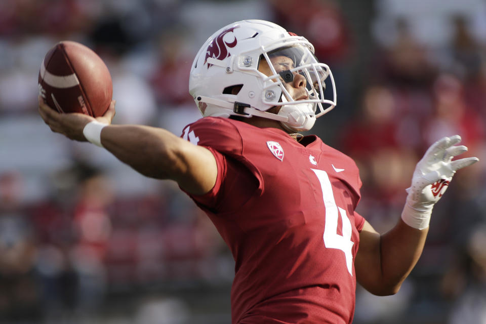 Washington State quarterback Jayden de Laura throws a pass during the second half of an NCAA college football game against Portland State, Saturday, Sept. 11, 2021, in Pullman, Wash. (AP Photo/Young Kwak)