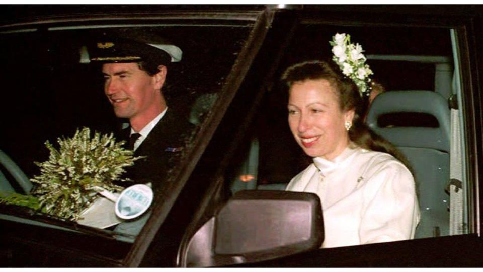 Sir Timothy Laurence and Princess Anne driving away from their wedding