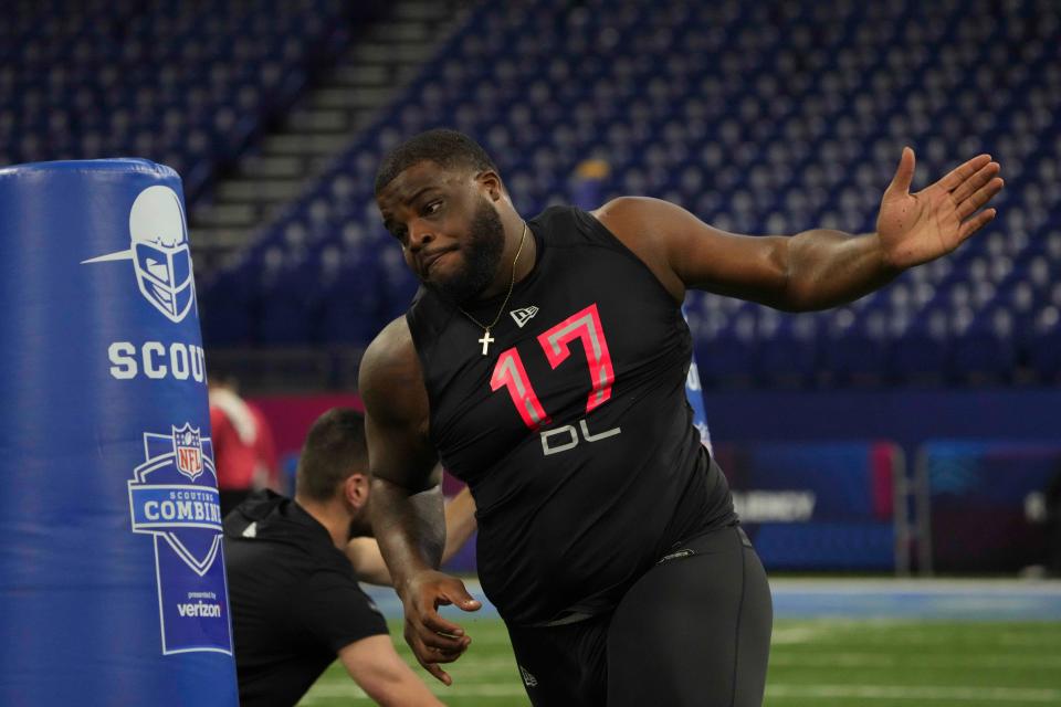 March 5: Kentucky defensive lineman Marquan Mccall  goes through drills.