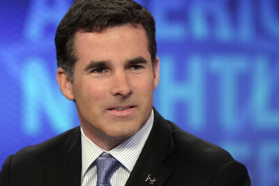 FILE - In this March 31, 2011, file photo, Kevin Plank, founder and CEO of Under Armour, appears on the "America's Nightly Scoreboard" program on the Fox Business Network, in New York. Plank will step down as CEO in the new year to become the company’s executive chairman and brand chief. Patrik Frisk, president and chief operating officer, will become only the second CEO of Under Armour since the athletic gear company was founded in 1996. (AP Photo/Richard Drew, File)