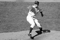FILE - New York Yankees' Fritz Peterson pitches in 1968. Peterson, the New York Yankees pitcher who created a controversy when he swapped wives and families with teammate Mike Kekich in 1973, died of lung cancer at his home in Winona, Minn., on Oct. 19, according to the death certificate filed with the Winona County Vital Records Department. He was 81. (AP Photo/File)
