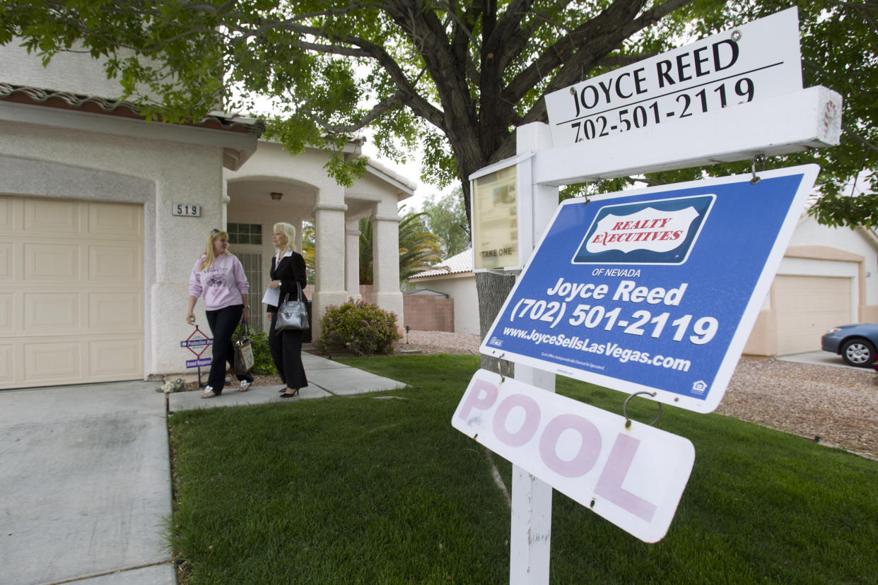 Realtor Helen Riley (L) and Fafie Moore, a Reality Executives owner/broker, leave a home being offered for sale in Henderson, Nevada. (Credit: Steve Marcus, Reuters)