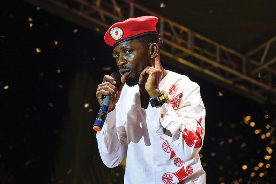 Ugandan musician turned politician Robert Kyagulanyi, commonly known as Bobi Wine, sings on a stage in Busabala, suburb of Kampala, Uganda, on November 10, 2018.