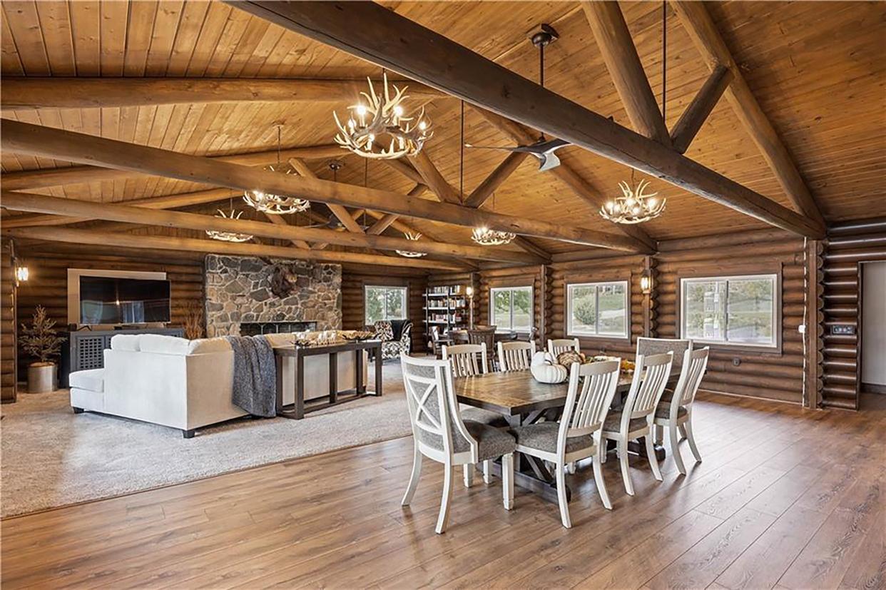 This striking home on Diamondhead Lake in Dexter is on the market for $1.1 million. See inside. Here, the main living space.