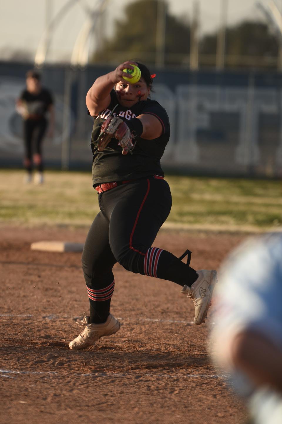 Oak Hills' Maddie Romo delivers a pitch in the fourth inning against Silverado on Tuesday, Feb. 13, 2024. Oak Hills beat Silverado 12-0 on the road in the season-opener.