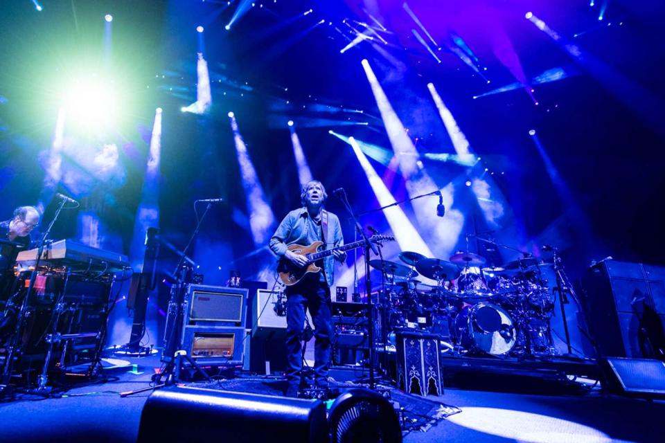 <p>Keith Griner/Getty</p> From left: Page McConnell, Trey Anastasio, Jon Fishman, and Mike Gordon of Phish perform at Bridgestone Arena in October 2023 in Nashville