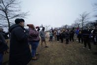 Amber Sherman of the group Decarcerate Memphis speaks to a group of demonstrators who gathered at dusk in Shelby Farms Park on Monday, Jan. 30, 2023, in Memphis, Tenn., in response to the death of Tyre Nichols, who died after being beaten by Memphis police officers. Nichols, who had a hobby in photography, frequented the park to photograph sunsets. (AP Photo/Gerald Herbert)