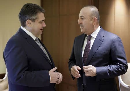 German Foreign Minister Sigmar Gabriel meets Turkish Foreign Minister Mevlut Cavusoglu at the Adlon hotel in Berlin, Germany, March 8, 2017. REUTERS/Auswaertiges Amt/Thomas Koehler-photothek.net/Handout via Reuters