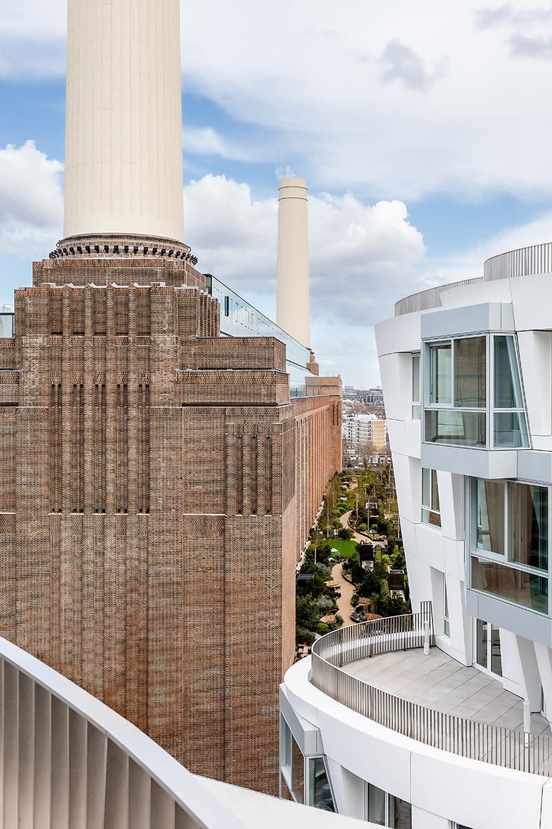 Exterior view of Prospect Place's curving facade next to the iconic Battersea Power Station.