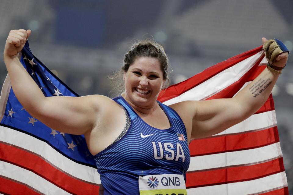 Deanna Price, of the United States, celebrates winning the gold medal for the women's hammer throw at the World Athletics Championships in Doha, Qatar, Saturday, Sept. 28, 2019. (AP Photo/David J. Phillip)