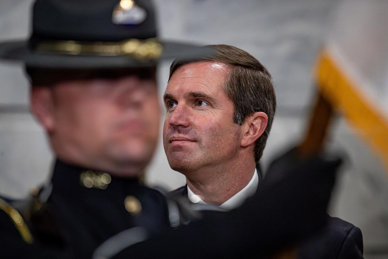 Kentucky Governor Andy Beshear stood at attention during the Pledge of Allegiance in the Capitol rotunda on the first day of the 2024 Kentucky General Assembly in Frankfort, Ky. Jan. 2, 2024